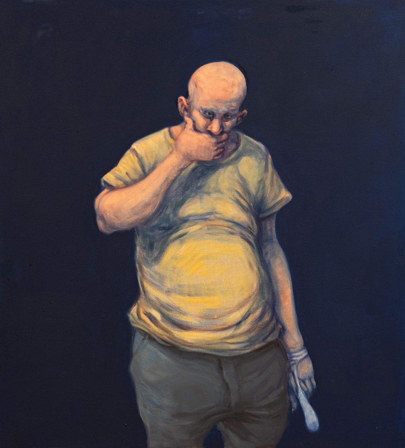 Oil painting by Michael Kvium depicting a bald figure in a yellow T-shirt covering his mouth against a dark blue background.